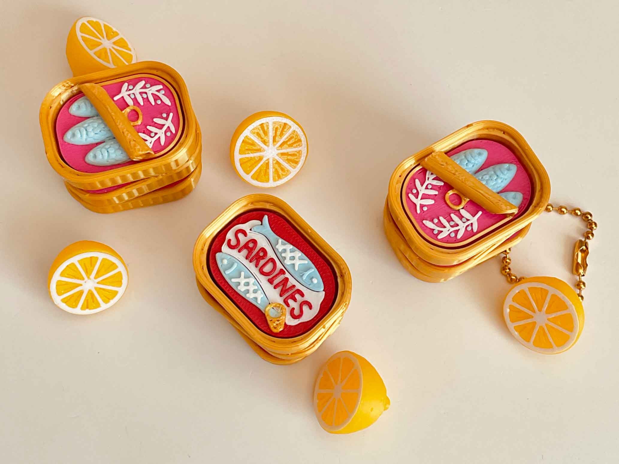 Sardine clicker with a little lemon keychain