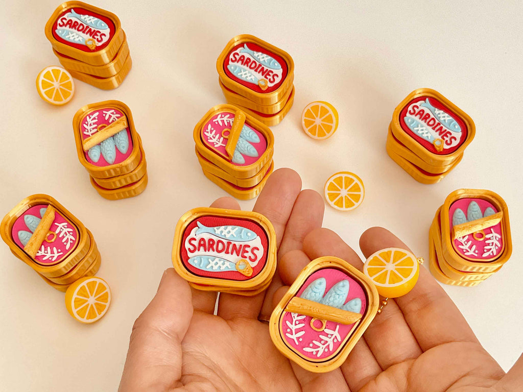 Sardine clicker with a little lemon keychain